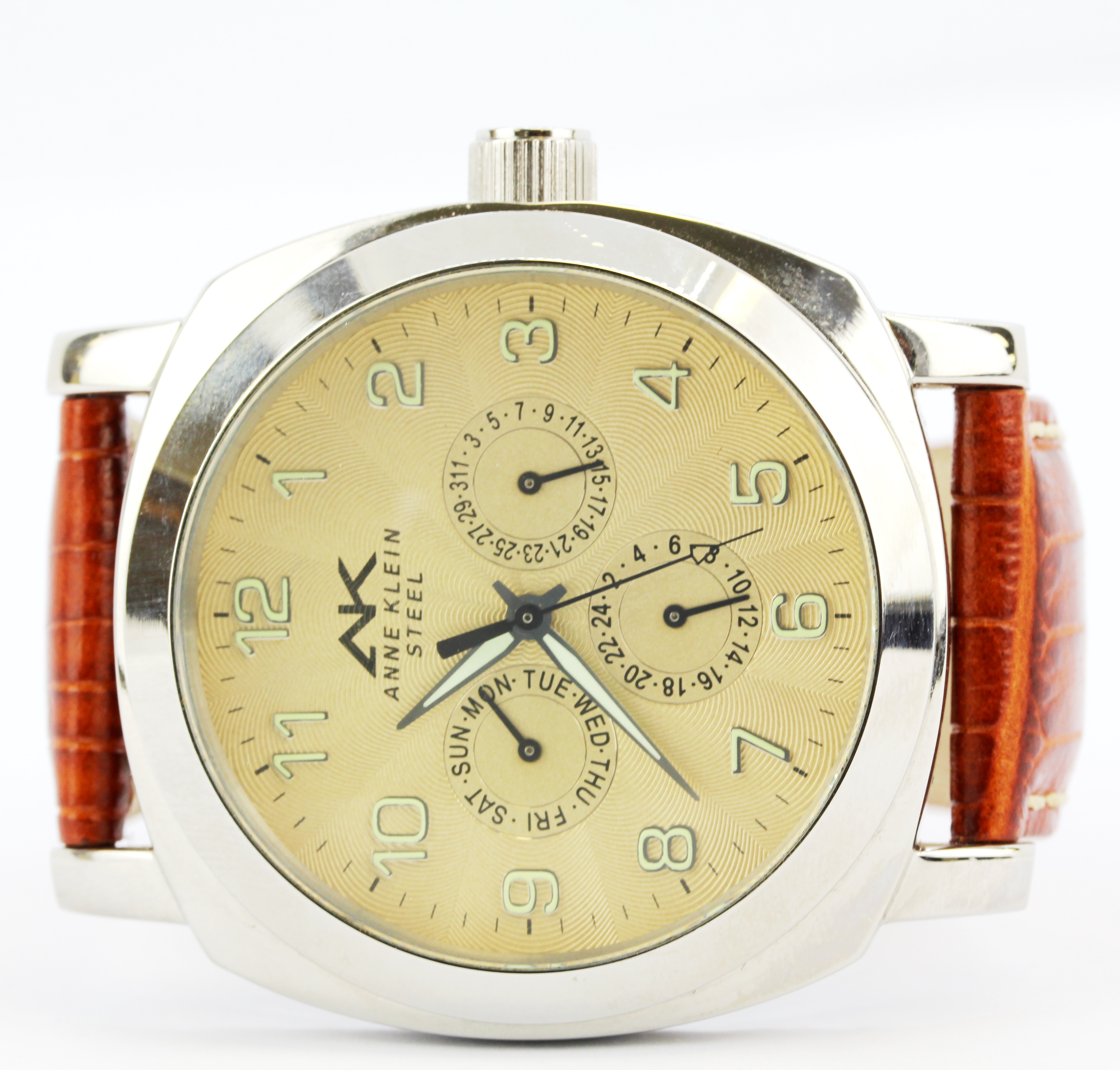 An Anne Klein steel chronographic (no. 6P29, 10/5273) wristwatch on a brown embossed leather strap.