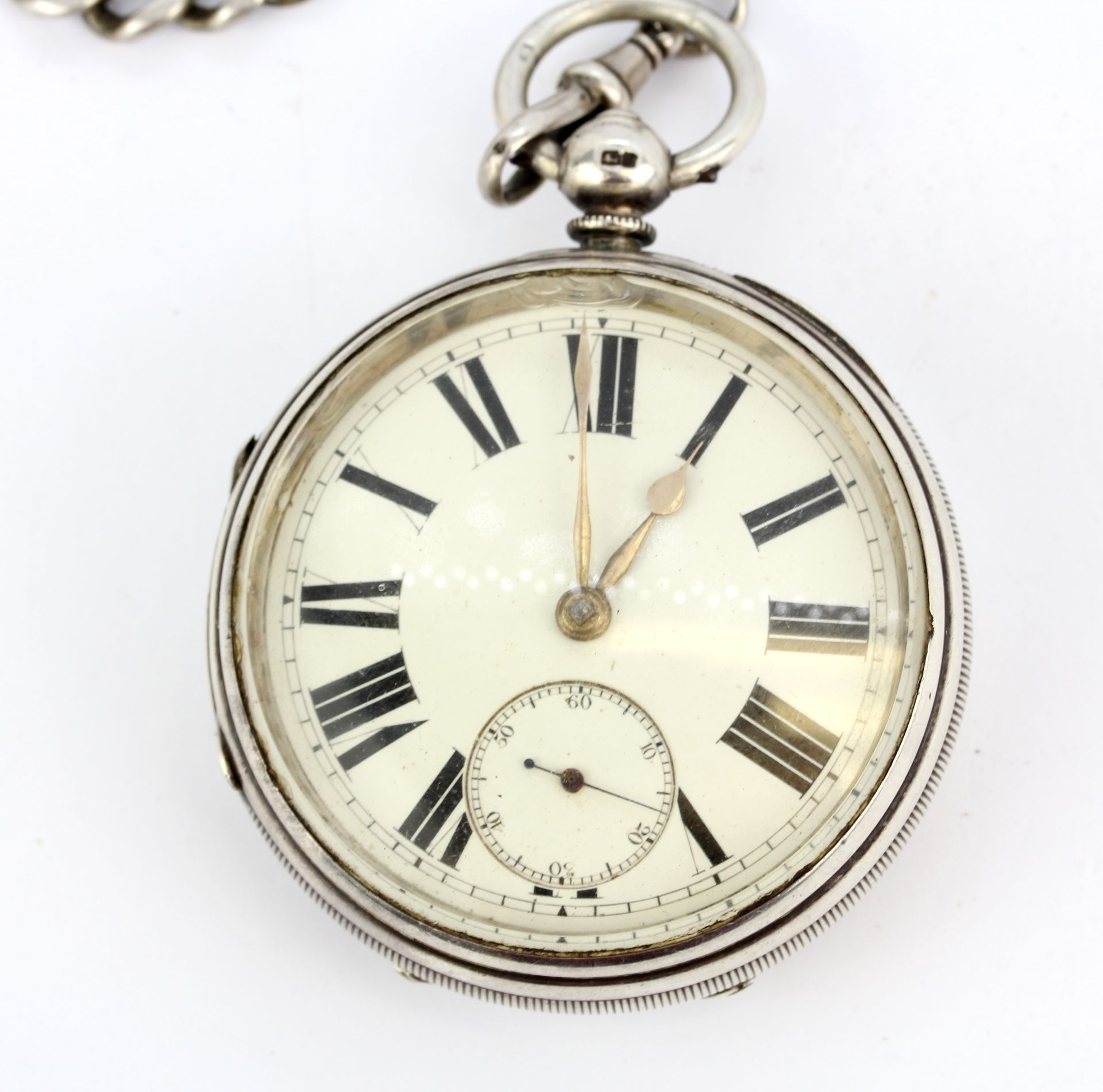 A heavy hallmarked silver cased key wind pocketwatch on a hallmarked silver Albert chain with key. - Image 2 of 3