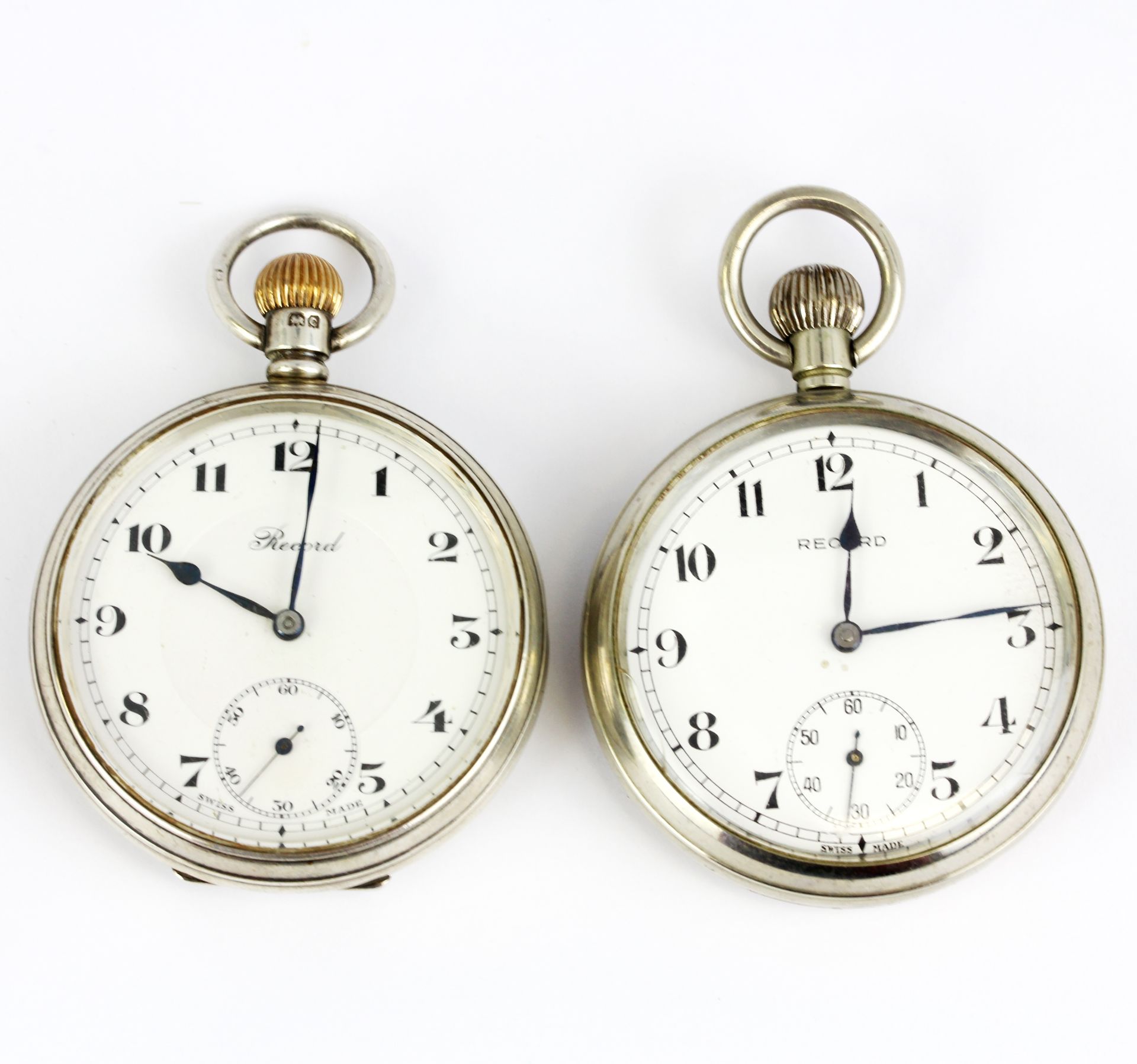 A hallmarked silver cased top wind 'Record' pocketwatch, together with a further white metal '