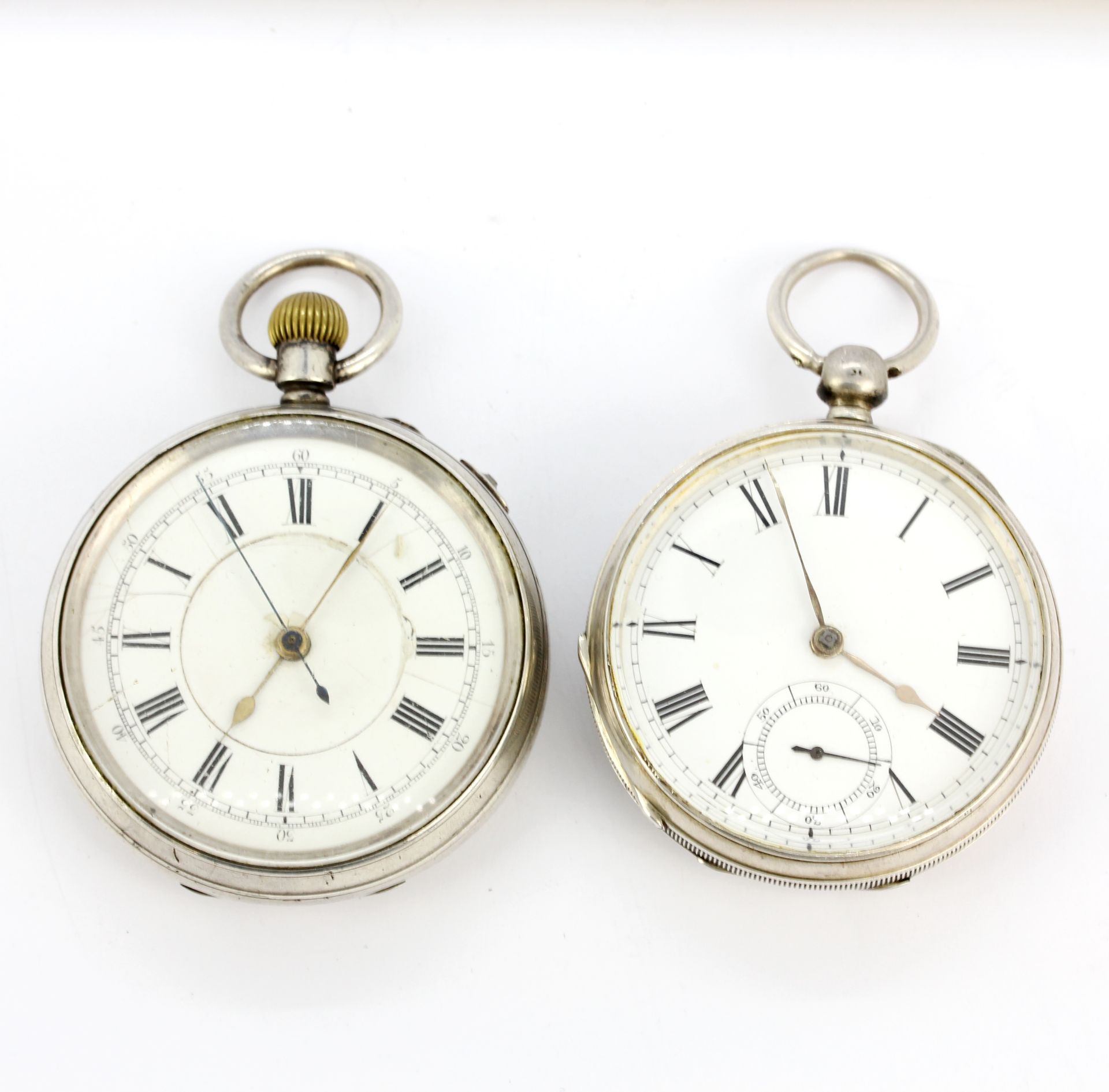 A hallmarked silver cased key wind pocketwatch, together with a hallmarked silver cased top wind