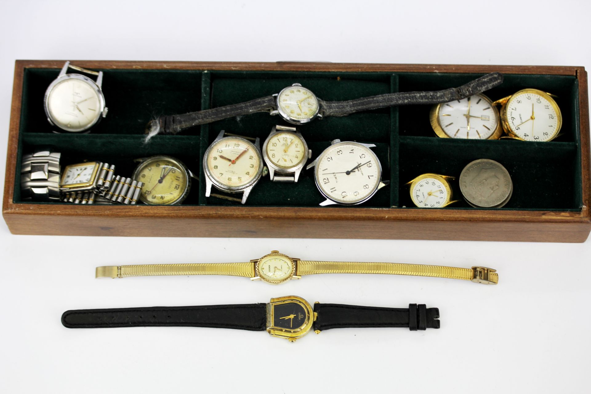 A group of wristwatches and watch faces.