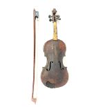 An antique violin and bow, violin L. 59cm.