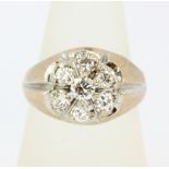 A heavy large 14ct yellow and white gold (stamped 14K) ring set with brilliant cut diamonds,
