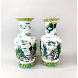 A pair of Chinese hand enamelled porcelain vases, H. 42cm.