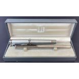 A stainless steel Dunhill fountain pen with a 14ct gold nib together with a Harley Davidson fountain