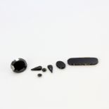 Six unmounted mixed cut Whitby Jet, approx. 14.33ct total.