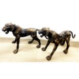 A superb pair of Oriental bronze figures of tigers, H. 83cm. L. 117cm.