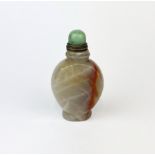 A Chinese carved marble snuff bottle with hardstone stopper.