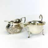 Two hallmarked silver jugs, Birmingham c. 1903 and Birmingham c. 1915 for Asprey & Co (sauceboat).