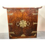 A bamboo finished Japanese brass mounted hardwood cabinet, W. 97cm. H. 87cm.