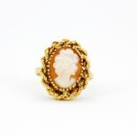 An 18ct yellow gold cameo ring, (Q).