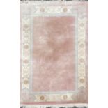 A large Chinese washed wool carpet, 298 x 188cm.