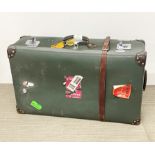 A traditional style leather cornered Globe Trotter suitcase, 83 x 27 x 49cm.
