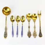 A group of mixed Russian silver gilt spoons.