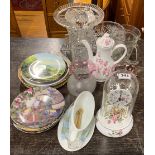 A quantity of glassware with an anniversary clock and collectors plates.