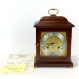 A Comitti brass dial mahogany cased small bracket clock with original 1997 receipt and box, H.