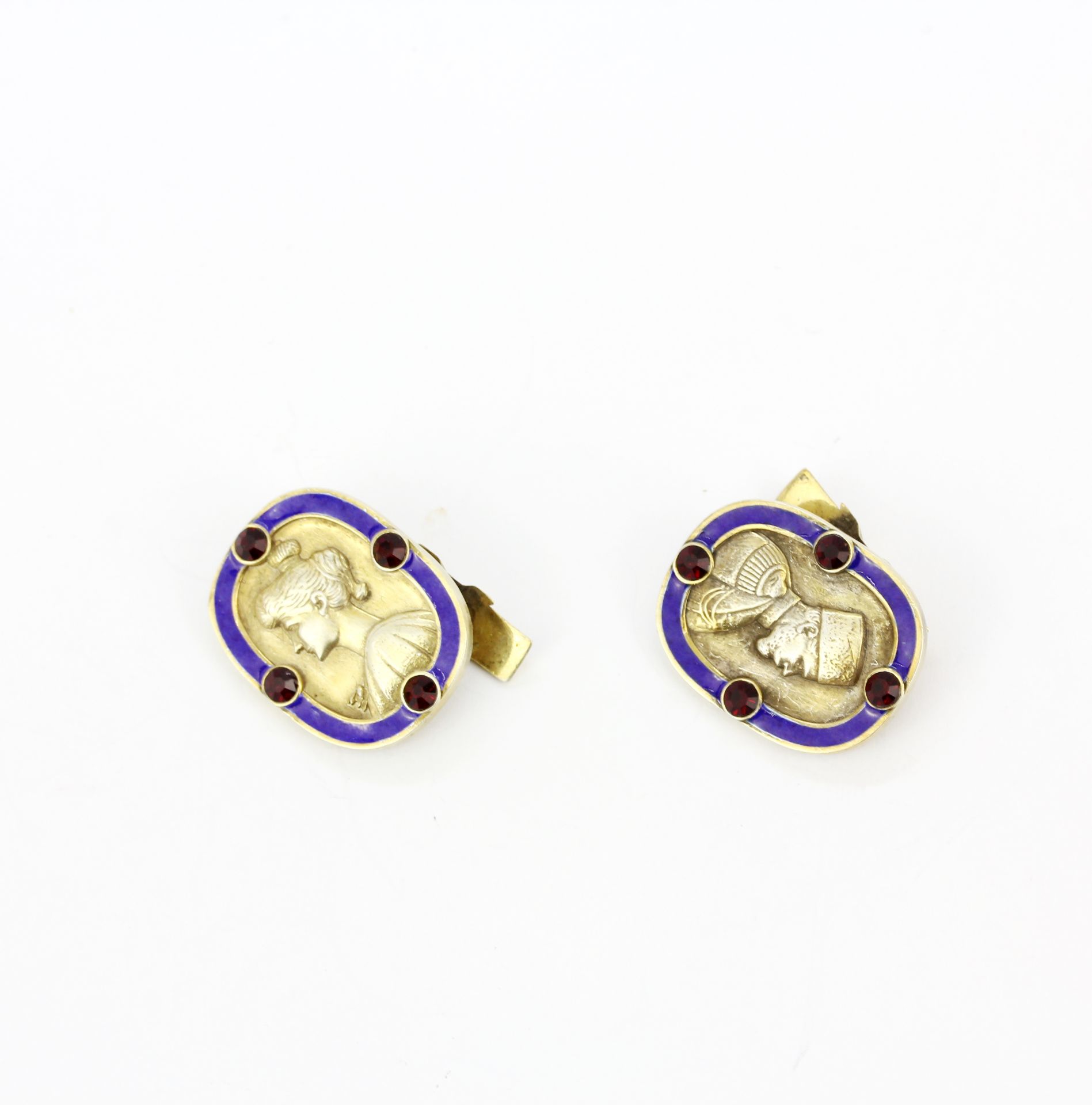 A pair of Russian hallmarked silver and enamel cufflinks set with round cut garnets, 2.3 x 1.8cm.