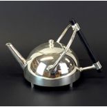 A Christopher Dresser style silver plated teapot, H. 15cm. W. 22cm.