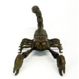 A Japanese bronze articulated model of a scorpion, L. 8.9cm.