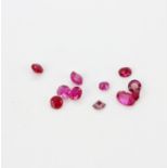 A quantity of small unmounted mixed cut rubies.