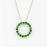 A 925 silver pendant set with round cut chrome diopside on a silver chain, L. 46cm, approx. 2ct.