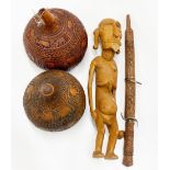 A carved tribal hardwood figure, H. 59cm. together with two carved gourds and a carved wooden