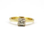 A yellow and white metal (tested minimum 9ct gold_ solitaire ring set with a large princess cut