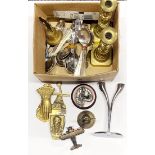 A box of mixed brass and cutlery items.