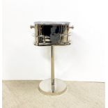 A silvered aluminium ice bucket and stand, H. 73cm. W. 44cm.