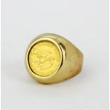 A yellow metal (tested 9ct gold) mounted Dos Pesos Mexican gold coin ring (M.5).