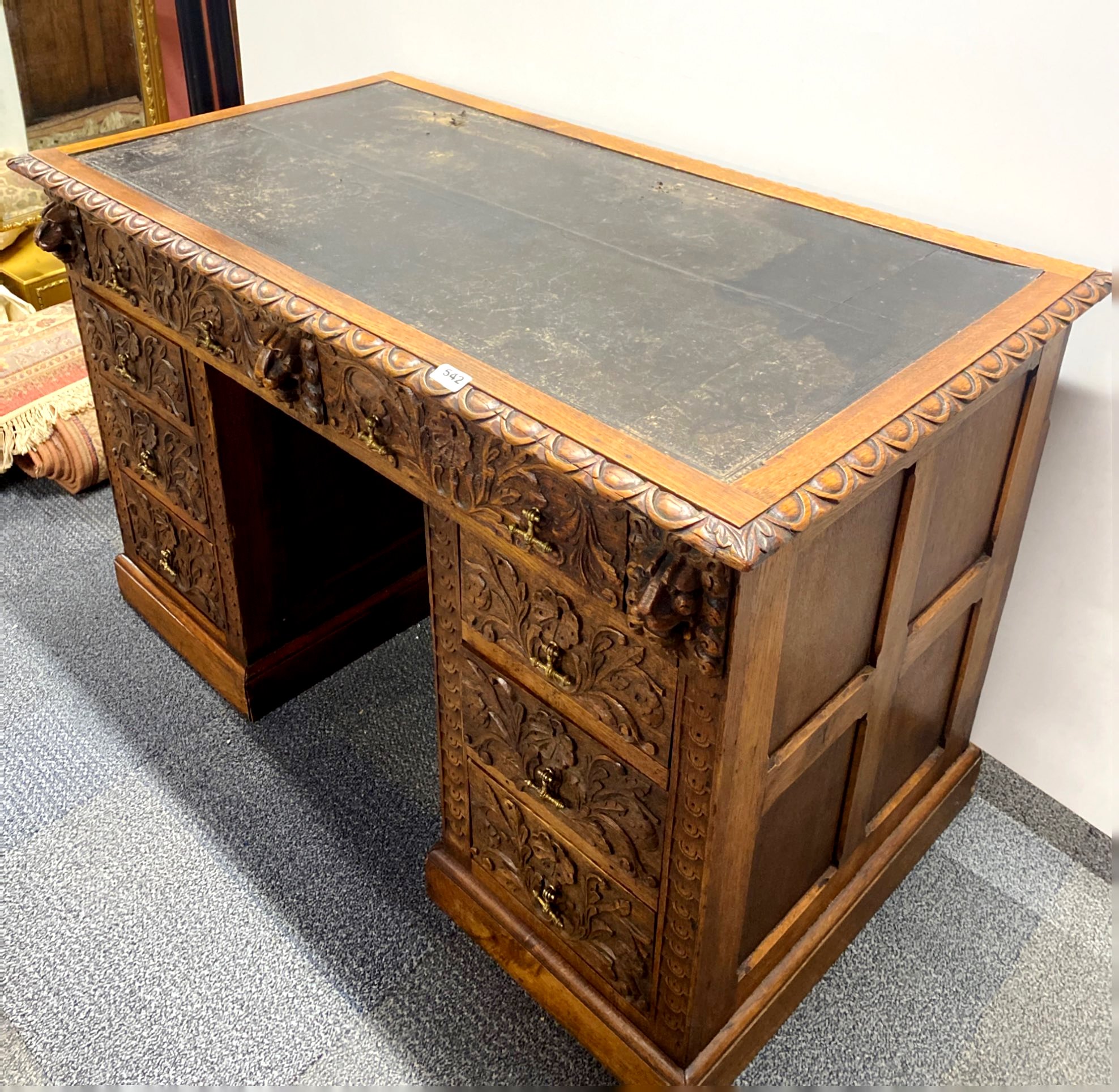 A 19th century carved oak desk, 120 x 65 x 77cm. - Image 4 of 4