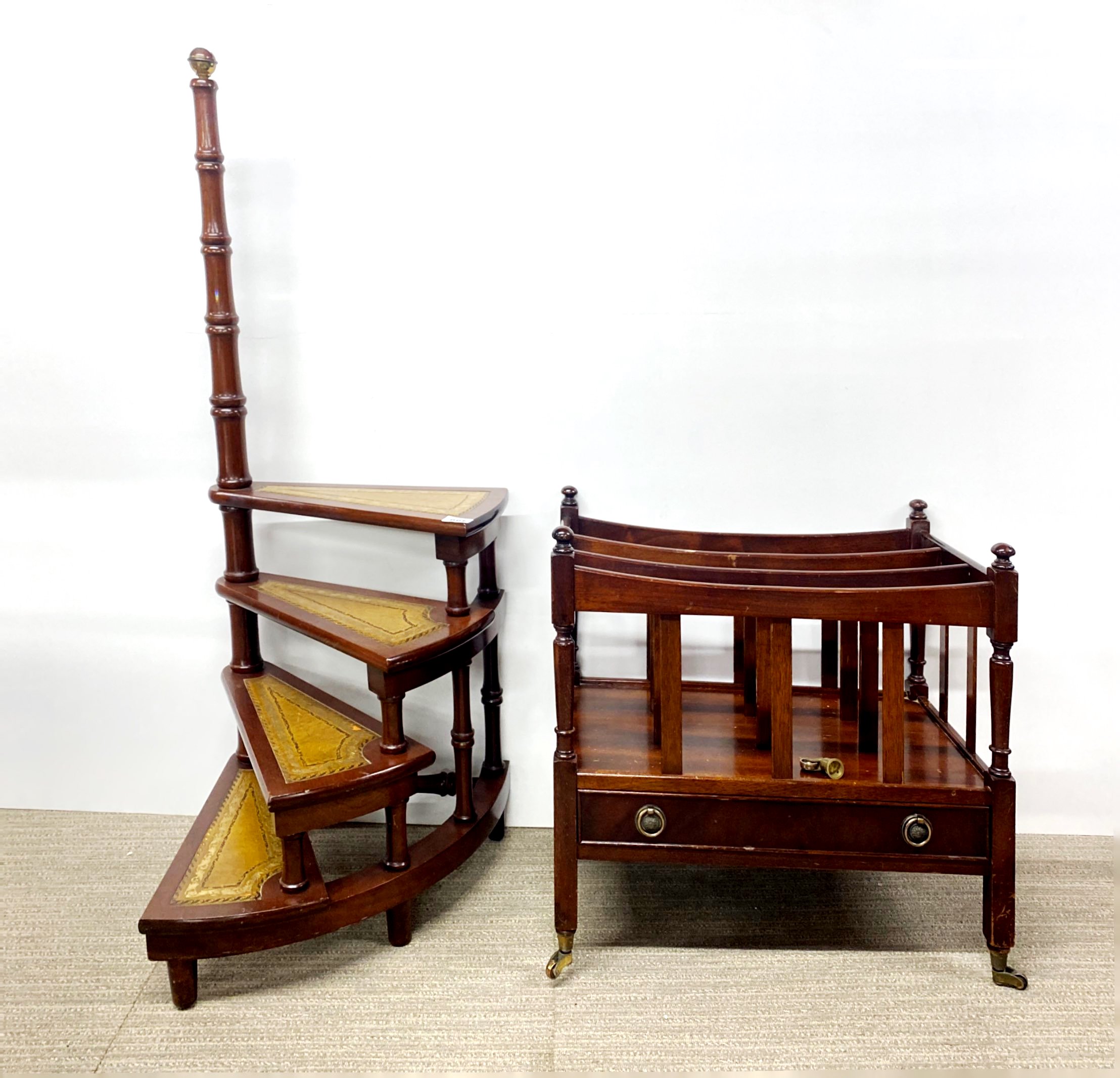 A contemporary mahogany and leather set of library steps with a mahogany canterbury.