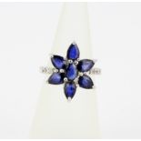 A 925 silver ring set with pear cut sapphires, approx. 2.97ct total, and cubic zirconia's, (K).
