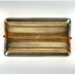 An Art Deco American sterling silver and gold match case dated 1904, 6 x 4.5cm.