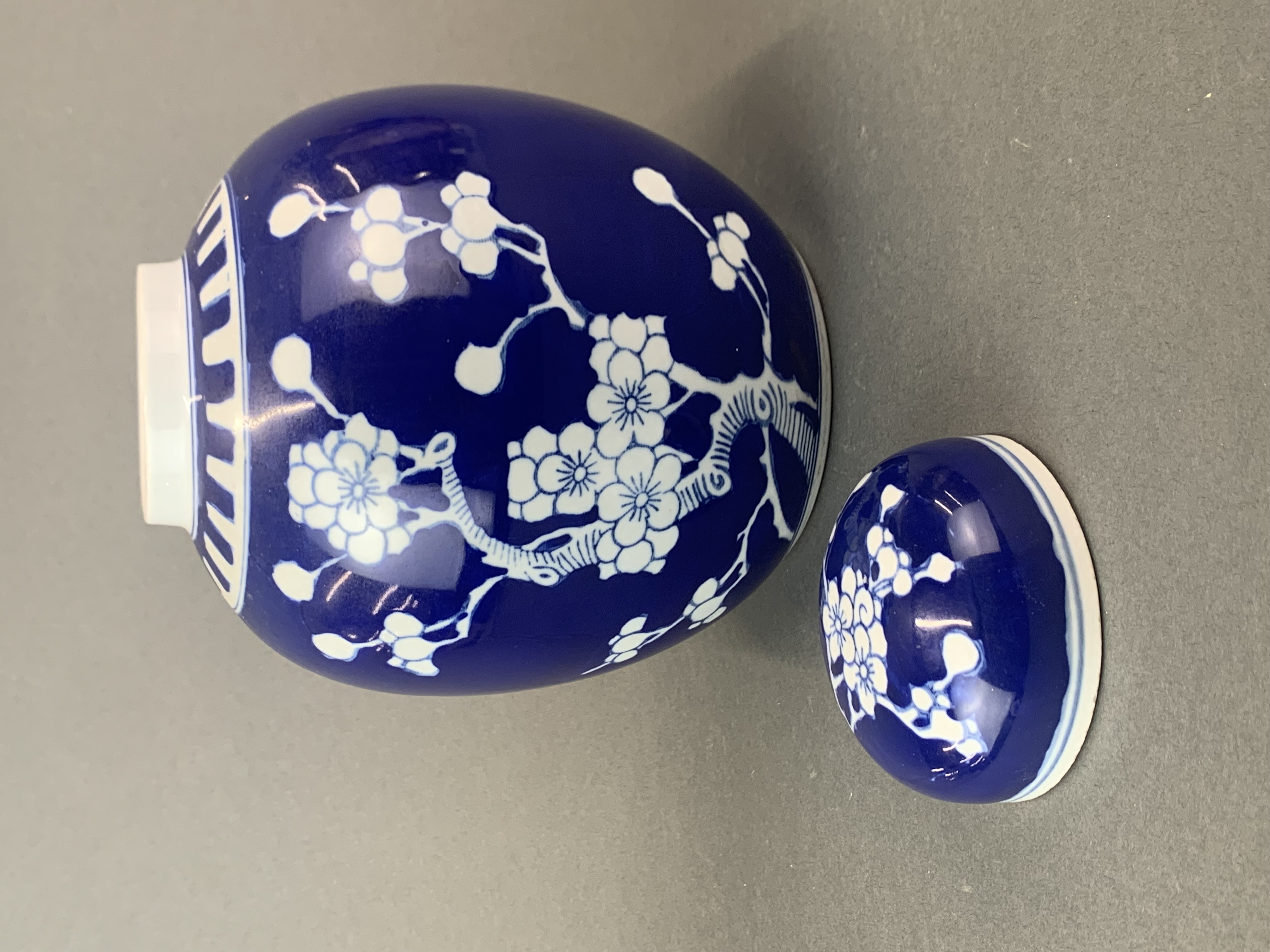 A Chinese prunus pattern porcelain ginger jar and lid, H. 21cm. - Image 3 of 4