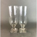 A pair of cut glass storm lanterns/vases, H. 34cm.