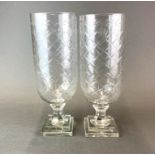 A pair of large cut glass storm lanterns/vases, H. 41cm.