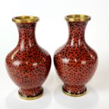 A pair of small mid 20th century Chinese cloisonne vases, H. 10cm.