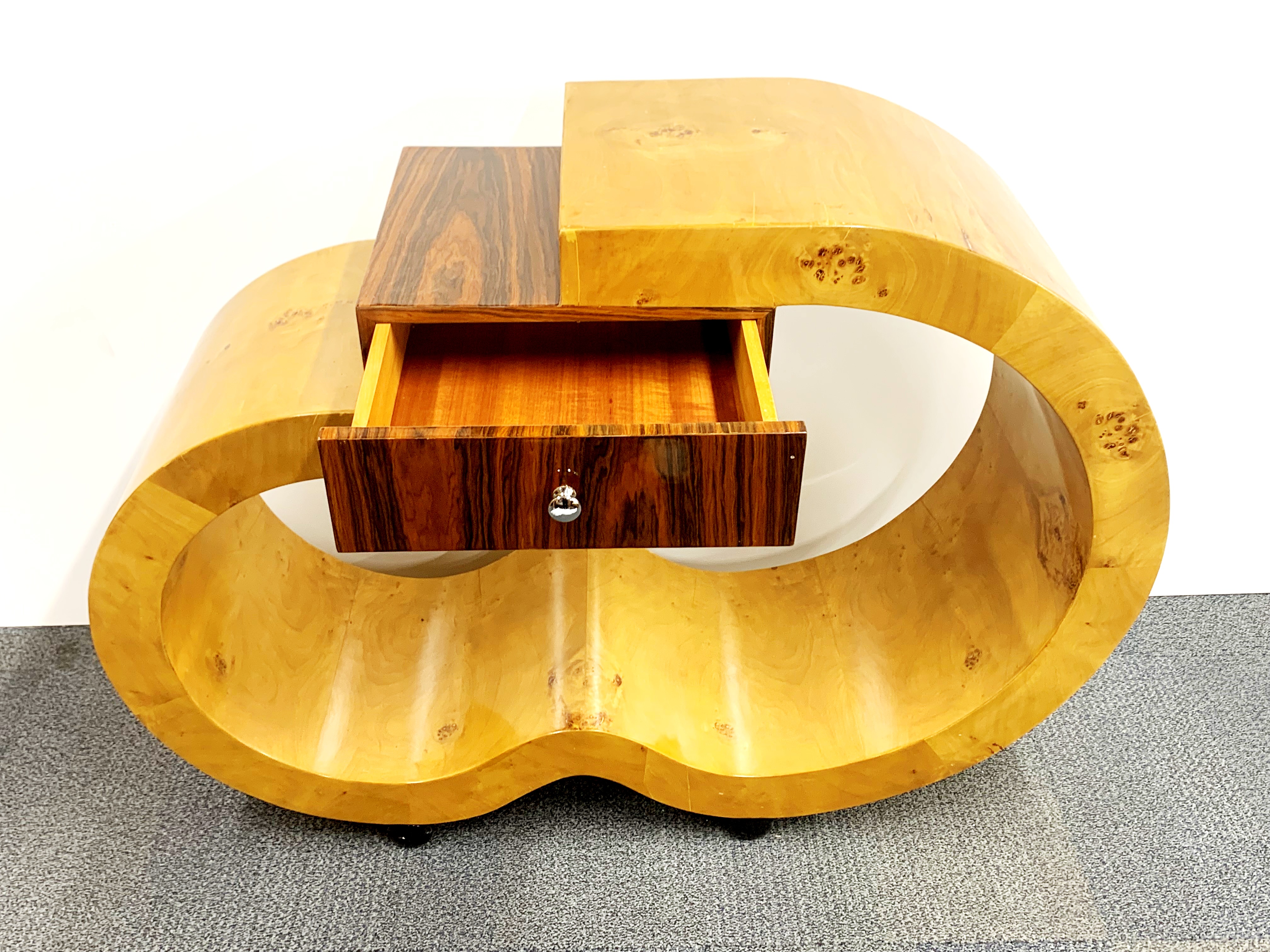 An unusual Art Deco style walnut veneered side table, W. 120cm. H. 90cm. - Image 4 of 4