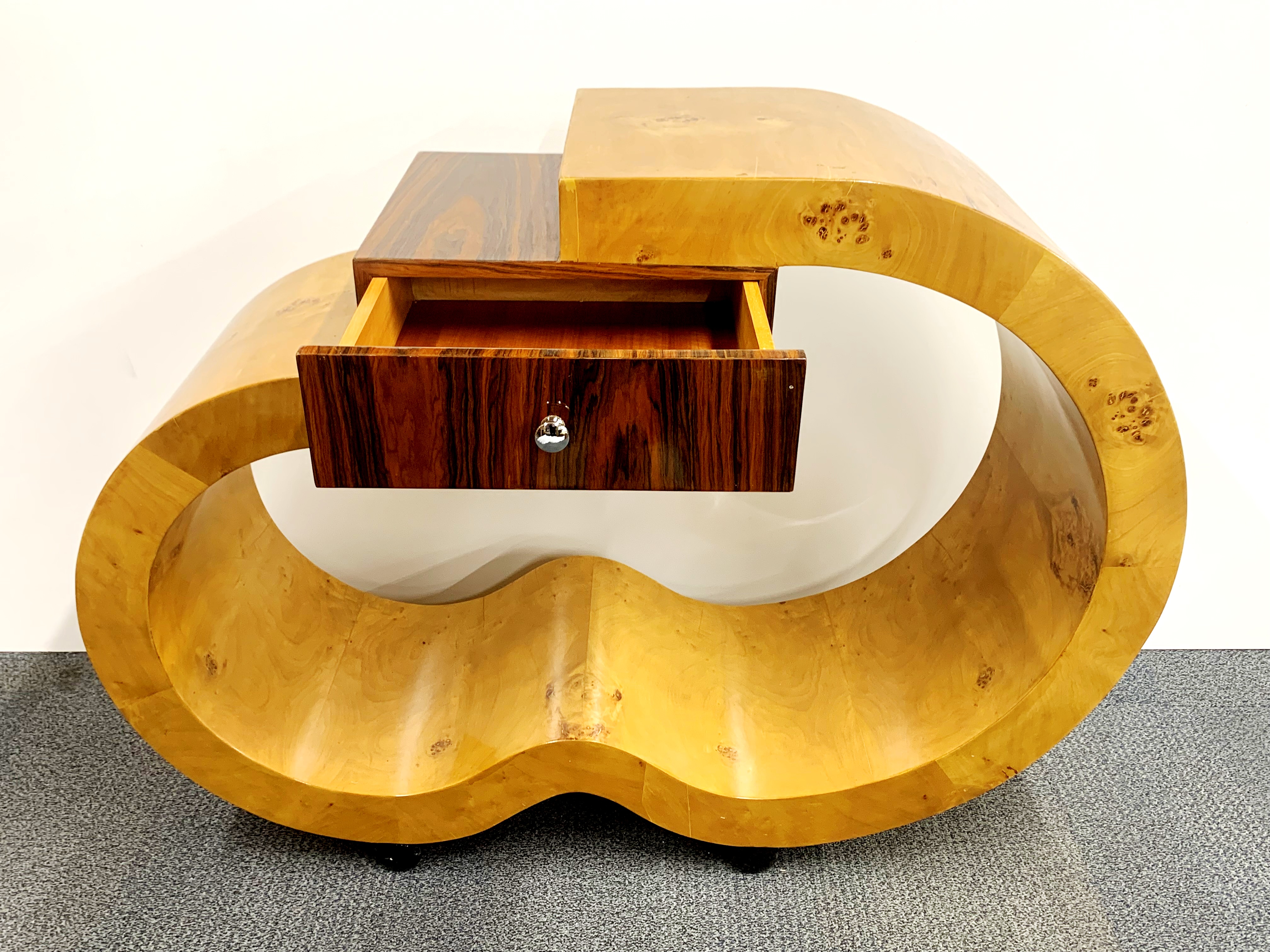 An unusual Art Deco style walnut veneered side table, W. 120cm. H. 90cm. - Image 3 of 4
