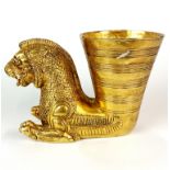 An oriental gilt bronze animal head vessel, L. 21cm, H. 14cm.