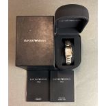 A lady's boxed two tone Emporio Armani wristwatch.
