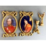 A pair of reproduction gilt framed portraits with a pair of gilt metal candlesticks, portrait size
