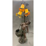A large cold cast figural table lamp, H. 100cm. A/F to rope.