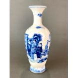 A Chinese hand painted porcelain vase decorated with a court garden scene, H. 30cm.
