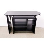 A black finished contemporary adjustable desk, W. 114cm.