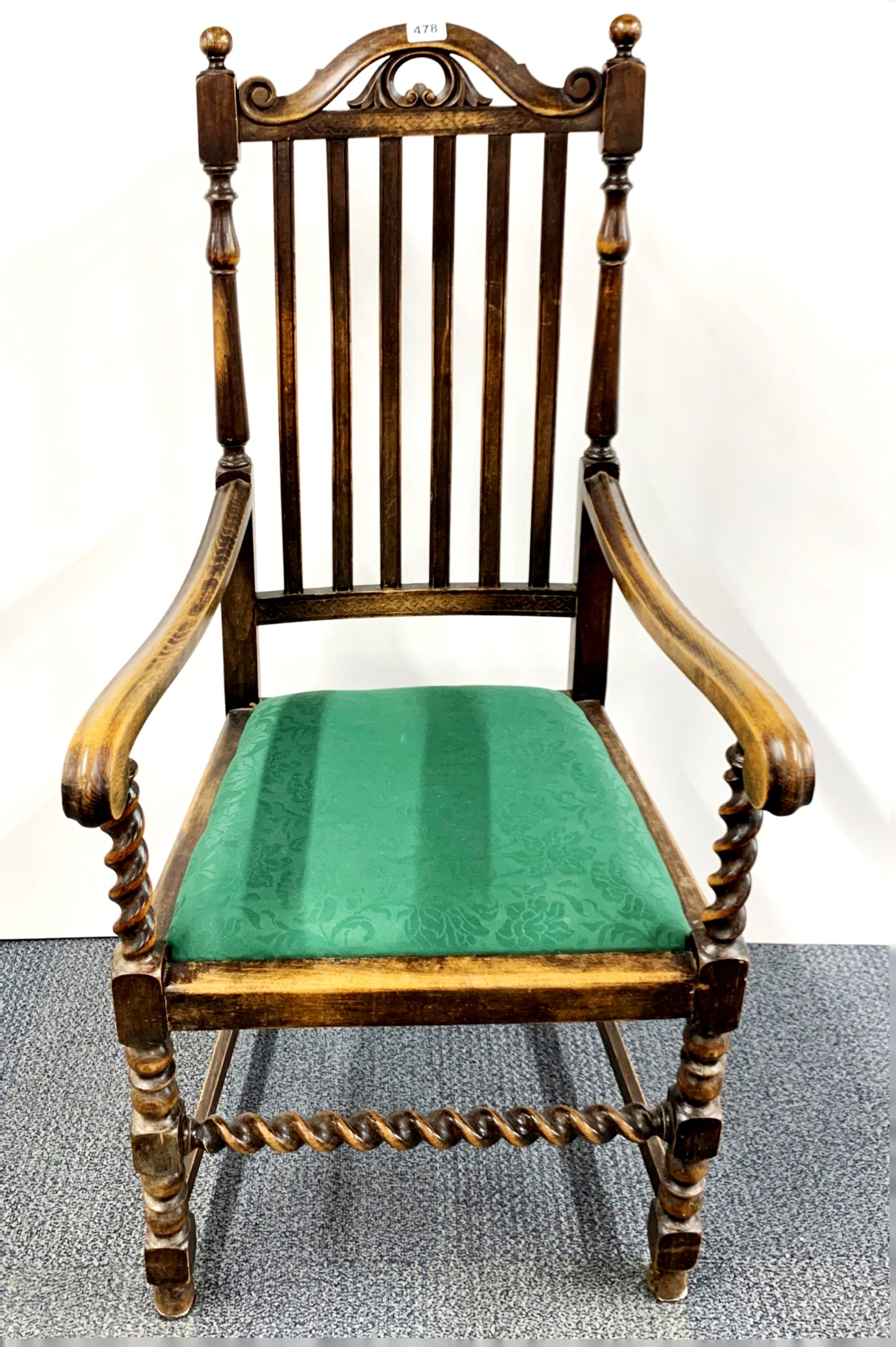 A carved oak barley twist hall chair.