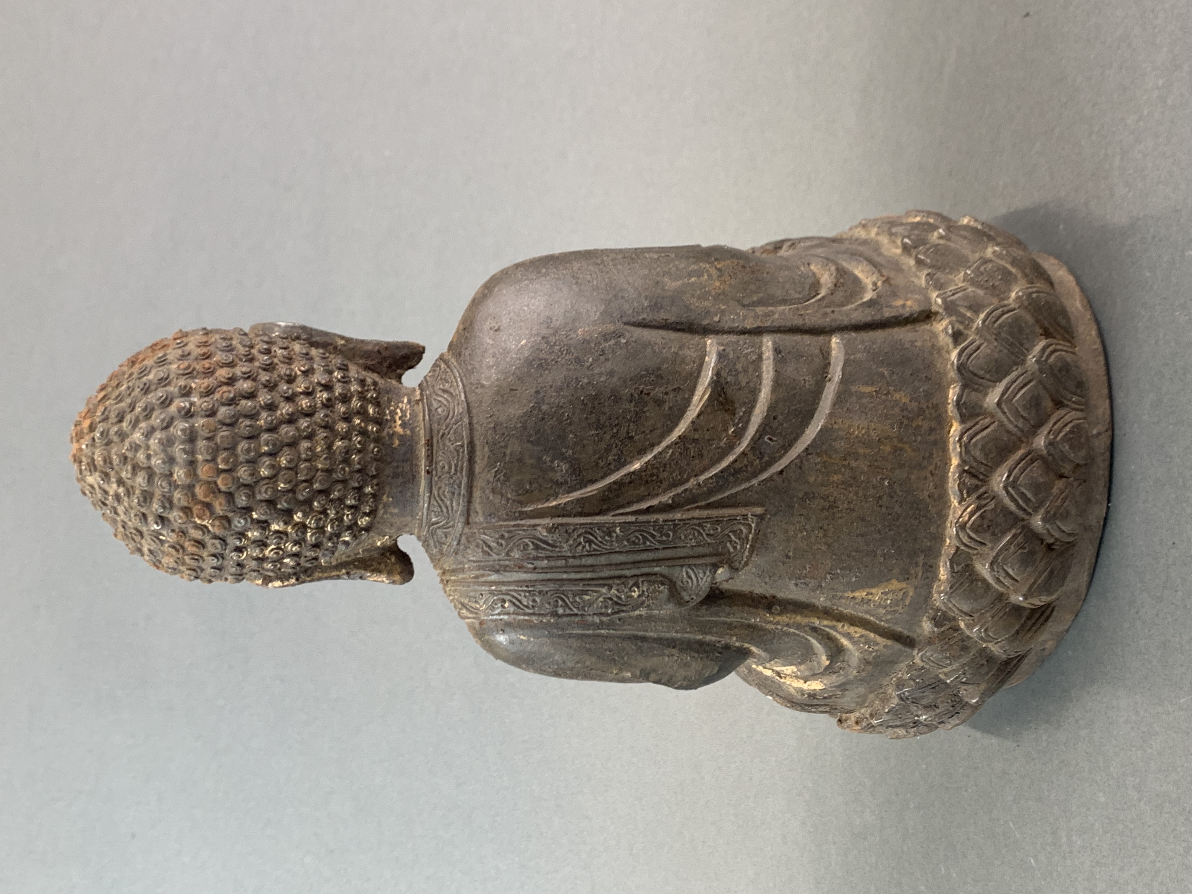 A Chinese gilt cast iron figure of a seated Buddha, H. 33cm. - Image 3 of 3