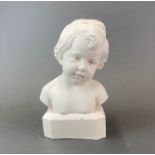 A reconstituted stone bust of a child, H. 25cm.