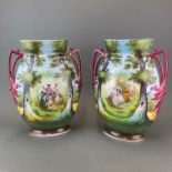 A pair of 19th Century continental hand painted porcelain vases, H. 36cm.